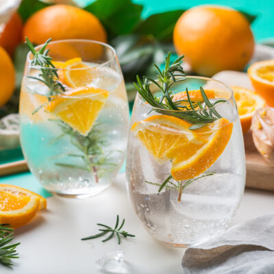 Hard seltzer cocktail with orange and zero waste bartenders accessories